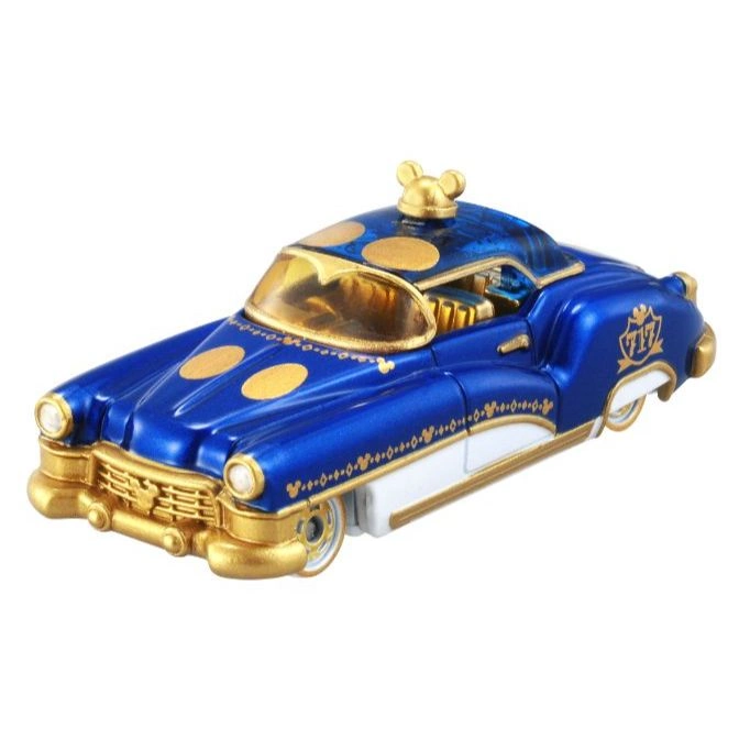 Blue and gold toy car with Mickey Mouse ears on top and polka dots.