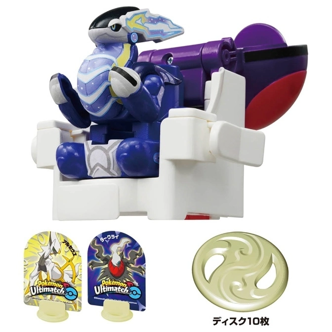 Pokemon toy with a dragon figure in a chair, cards, and a coin.