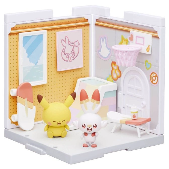 Pokémon playset with Pikachu, Scorbunny figures, skateboard, table, and basketball hoop.