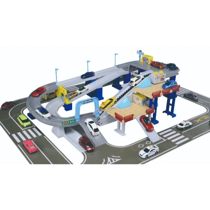  Toy car parking garage with ramps, roads, and miniature vehicles.