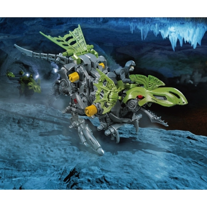  Grey and green dinosaur robot toy with a rider, set in a cave.