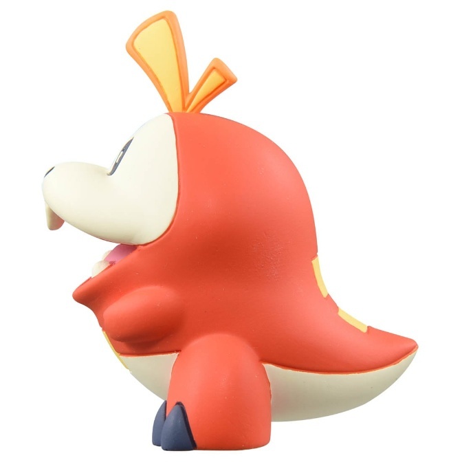 Fuecoco Pokémon figure, side view. Orange body, cream face, yellow crest, and dark blue feet.
