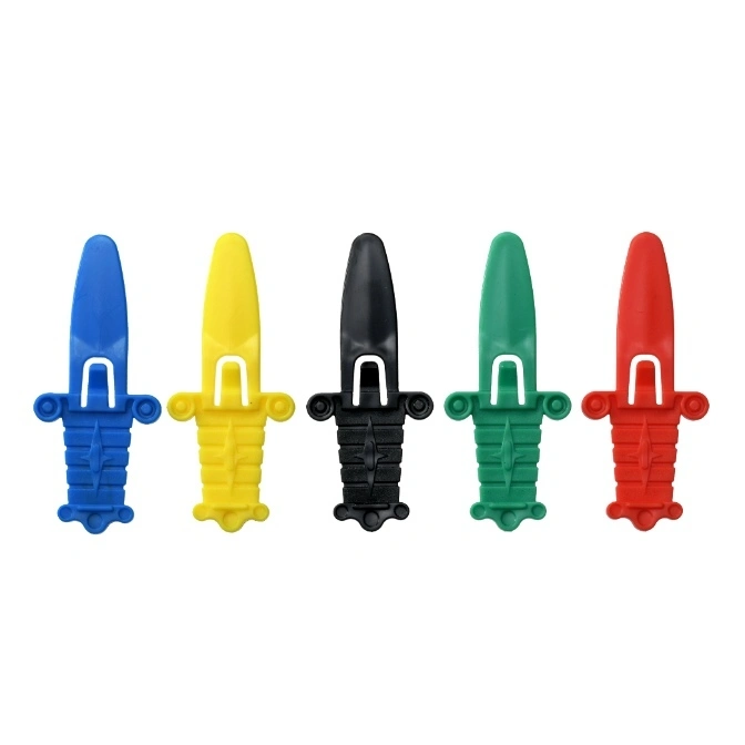  Five colorful plastic toy daggers: blue, yellow, black, green, and red.