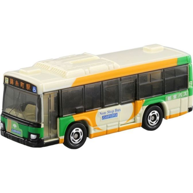 Toy bus with green, yellow, and white paint, featuring "Non-Step Bus" text.