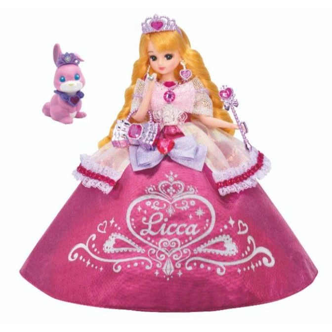 Licca doll in pink gown with crown, purse, wand, and bunny friend.