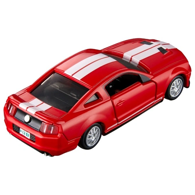  Red toy Mustang with white racing stripes. Diecast model car.