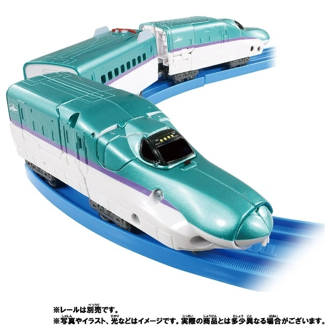  Teal toy bullet train on blue tracks. Two cars are visible, with white and purple accents.