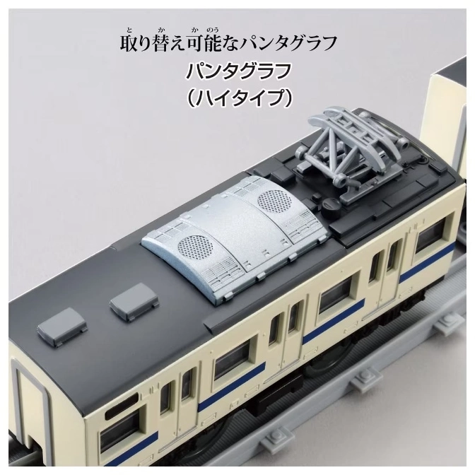  Toy train with pantograph on a track, beige and dark gray color scheme.