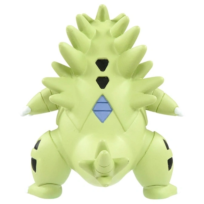  Green Tyranitar toy figure with spikes and geometric patterns on its back.
