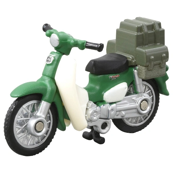  Green toy motorcycle with luggage rack and black seat.