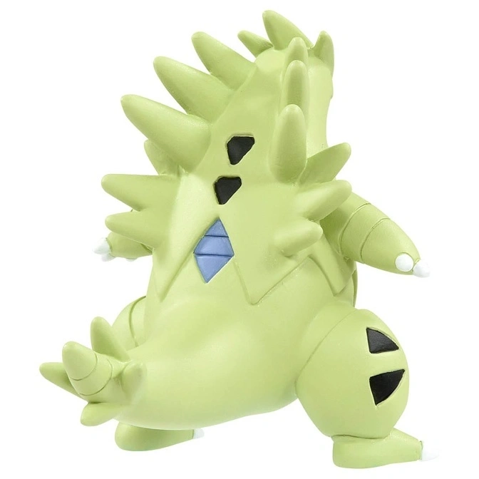  Green Tyranitar toy figure with spikes, diamond chest, and black triangle markings.