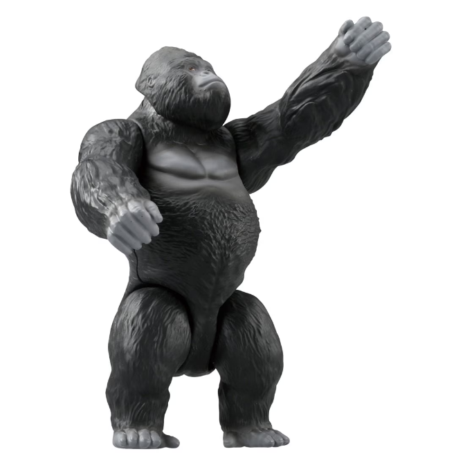  King Kong toy figure standing with one arm raised.