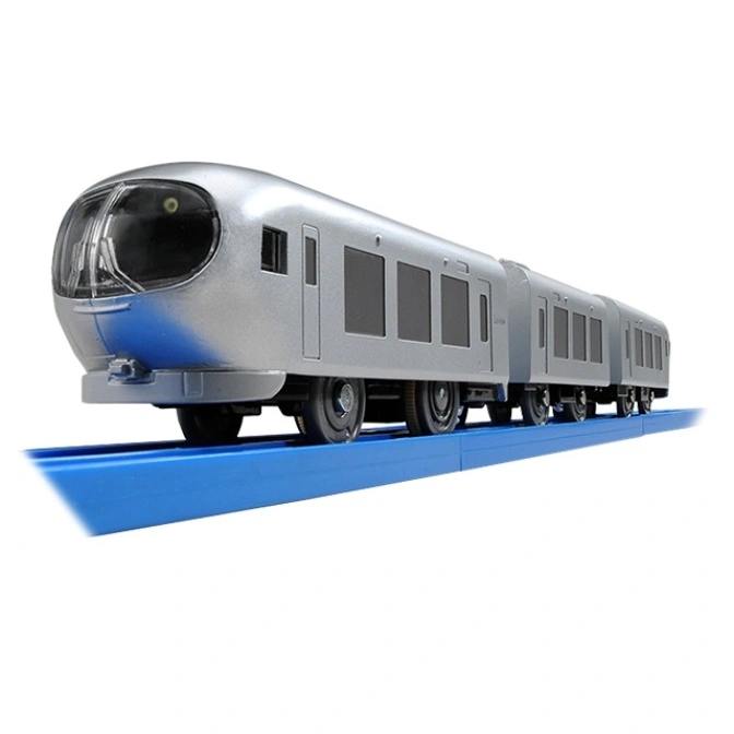 Silver toy train on blue track. Bullet train design with multiple cars.