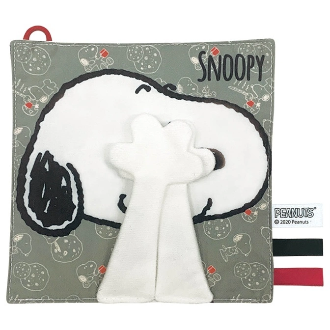 Snoopy-themed soft baby book with tactile elements and a red loop for attachment.