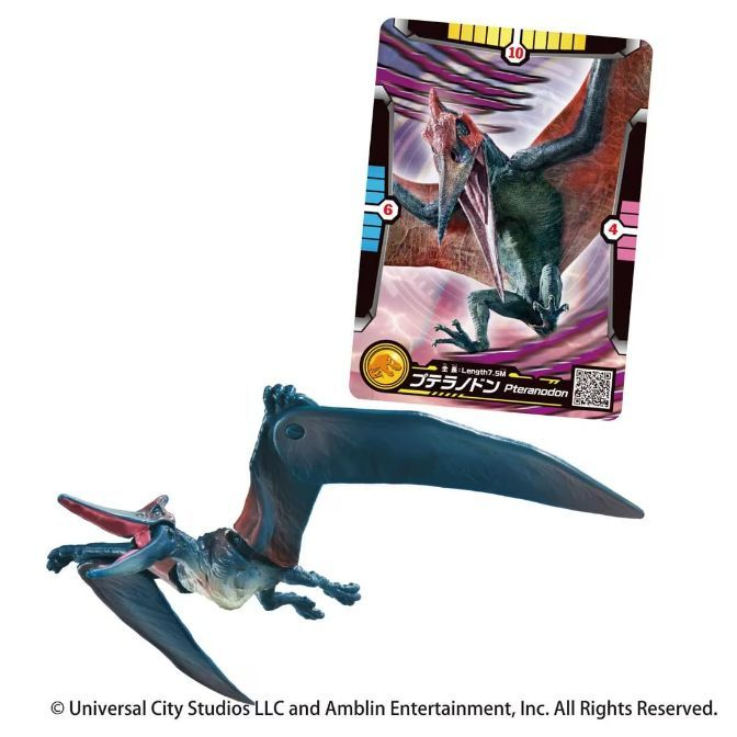 Pteranodon toy and card. The toy is blue with red accents. The card shows a Pteranodon with stats.